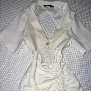 dress with neckline and open back with knot below